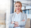 Portrait of a confident mature businesswoman working in a modern office. Portrait of a confident mature businesswoman working in a modern office.